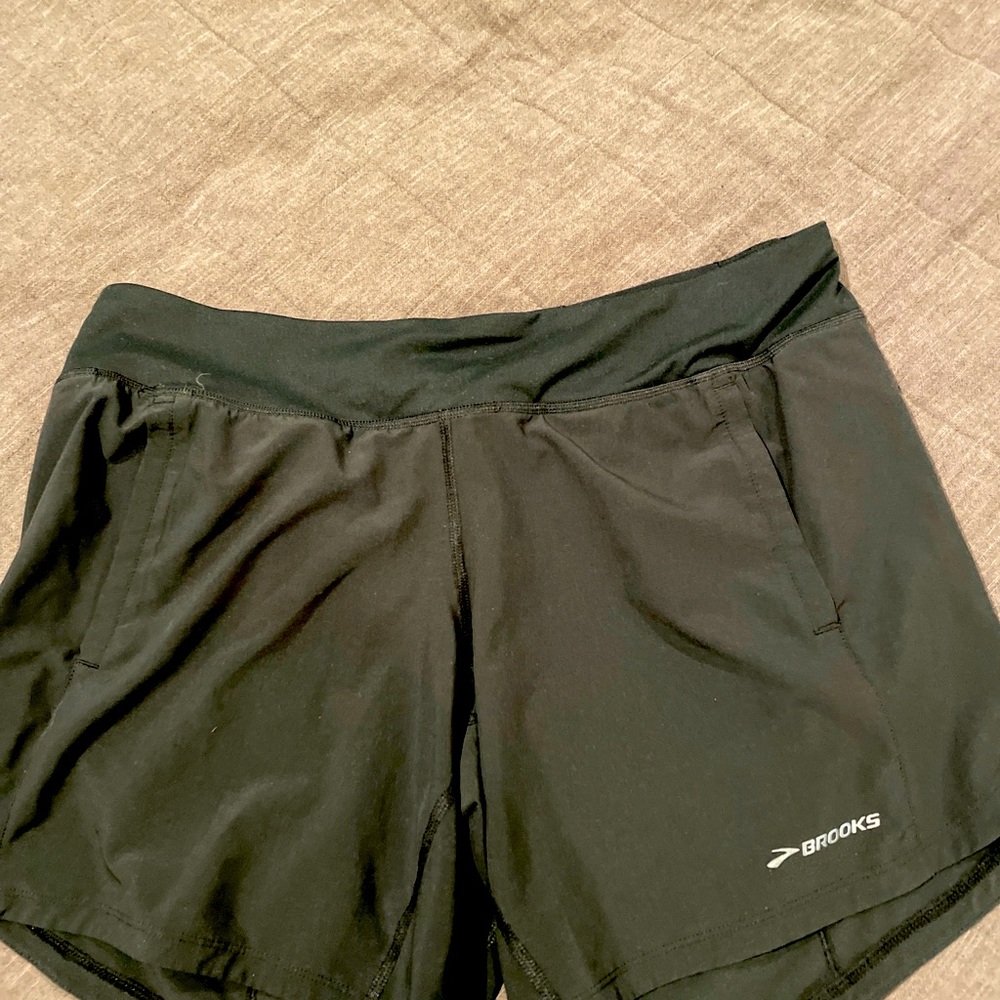 Brooks Chaser 7” inseam shorts. Black, lots of pockets, comfortable fabric.